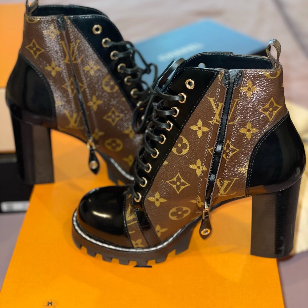 Louis Vuitton star trail ankle boots.